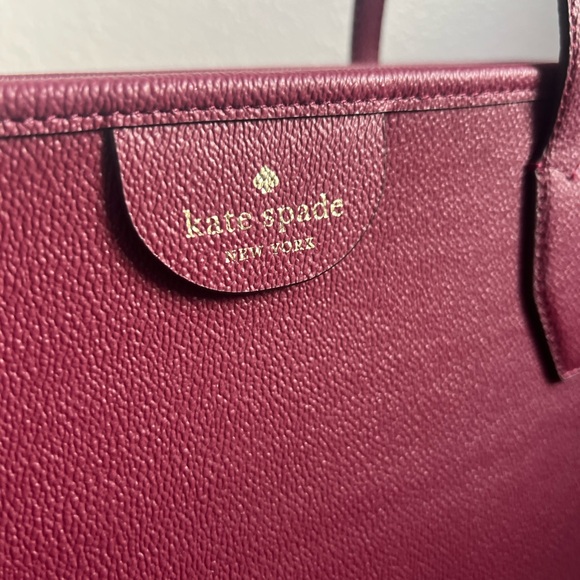 kate spade Handbags - NWOT Kate Spade Lori Tote, Burgundy - Shoulder bag with zippered closure